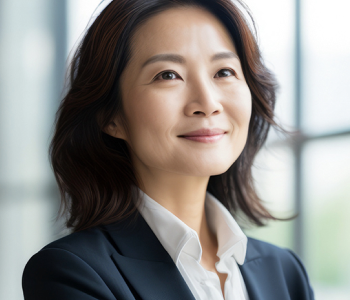 Asian woman in business suit representing people work in accounts payable roles